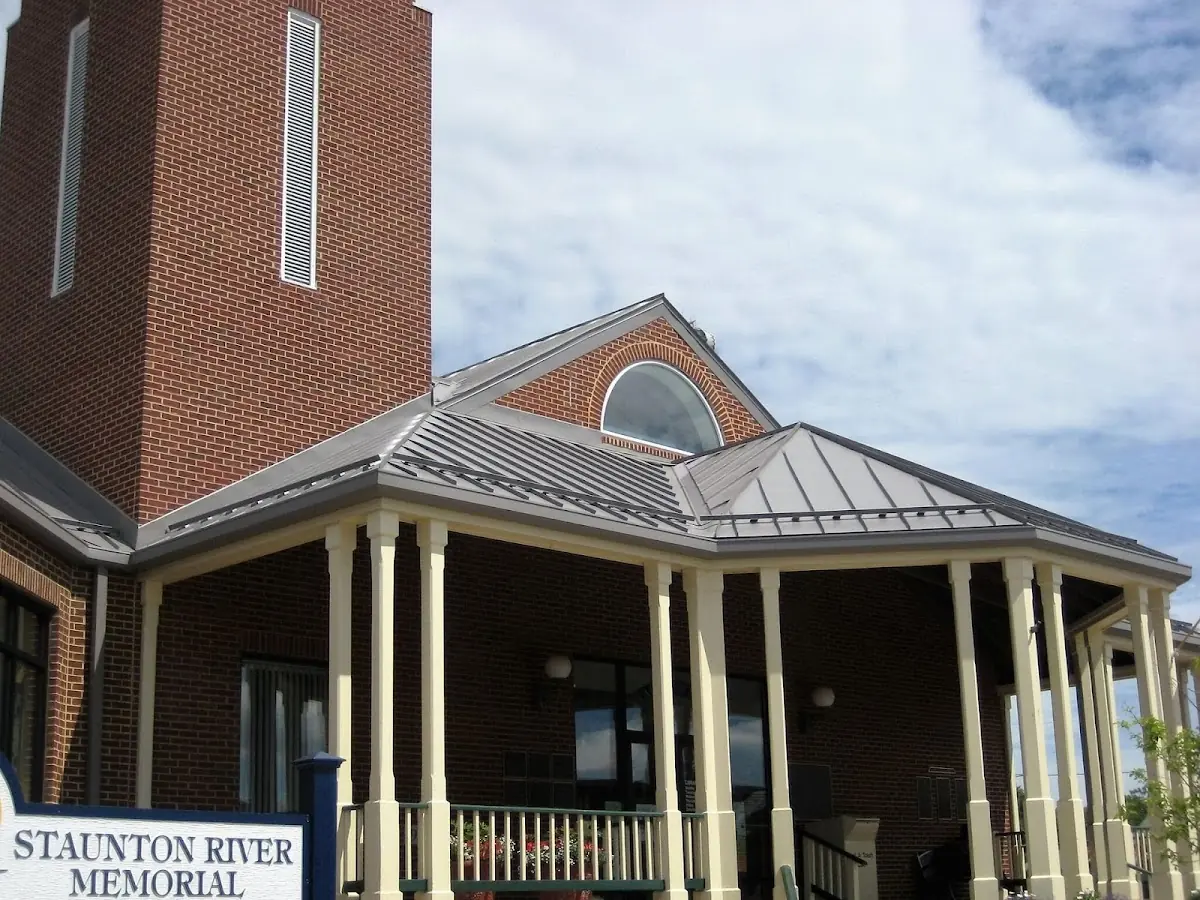 Skilled roofing craftsmen working on a residential roof in Downtown Chamblee